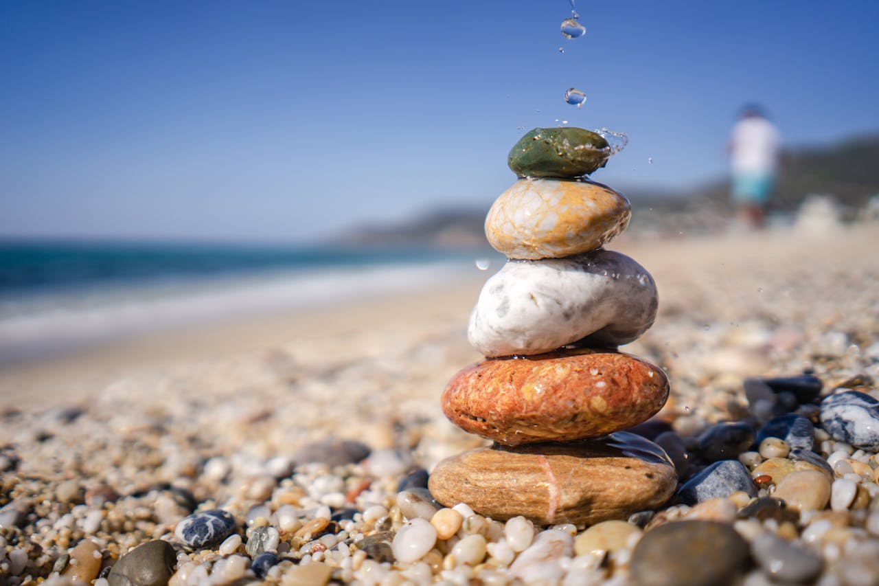 Shallow Focus Photo of a Cairn